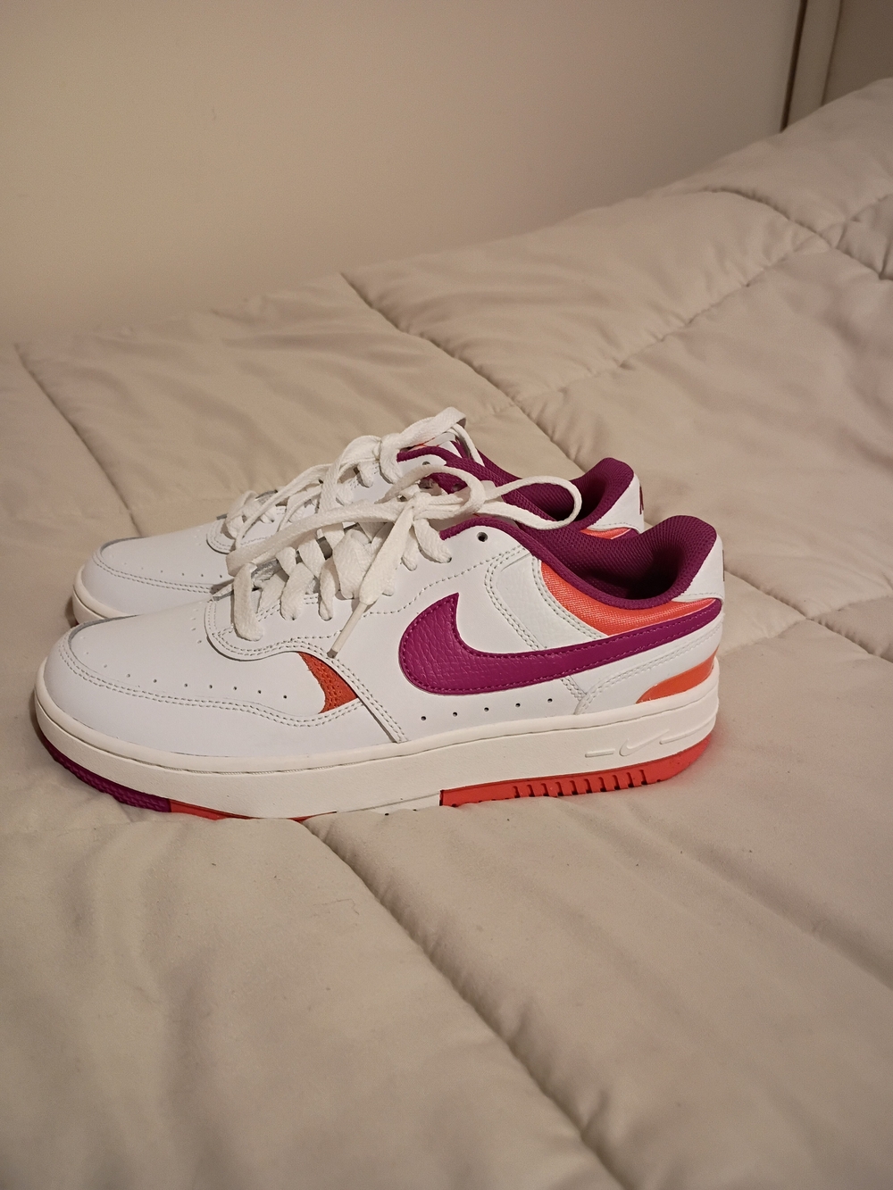 Nike Women's White Sneakers with Purple & Orange Accents